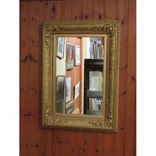 1221 - GILT WOOD MOULDED WALL MIRROR 84 x 62 cms