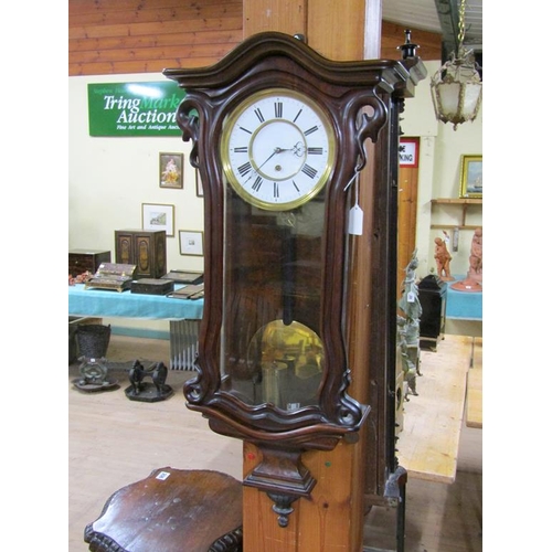 23 - A late 19c Austrian single weight Vienna regulator in a small serpentine walnut case.  The movement ... 