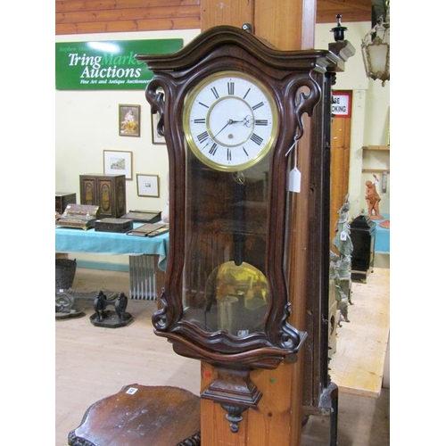 23 - A late 19c Austrian single weight Vienna regulator in a small serpentine walnut case.  The movement ... 