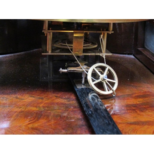 23 - A late 19c Austrian single weight Vienna regulator in a small serpentine walnut case.  The movement ... 