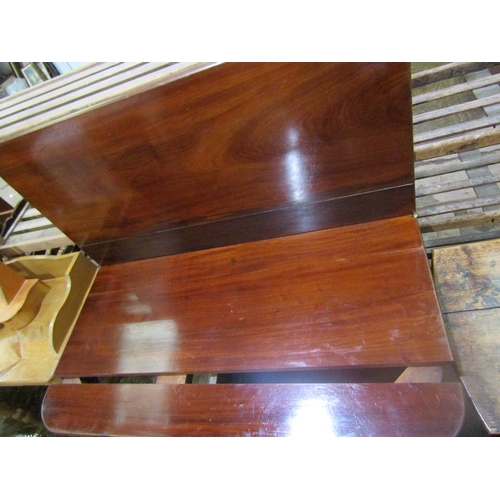 864 - FOLD OVER MAHOGANY TEA TABLE