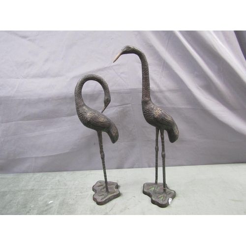 1295 - PAIR OF PATINATED BRONZED FIGURES - STORKS, EACH 49 & 45 cms H
