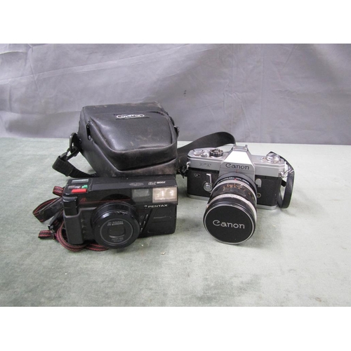 1298 - PENTAX AF ZOOM 200M70 CAMERA TOGETHER WITH A CANON FT CAMERA AND LENS IN CAMERA BAG
