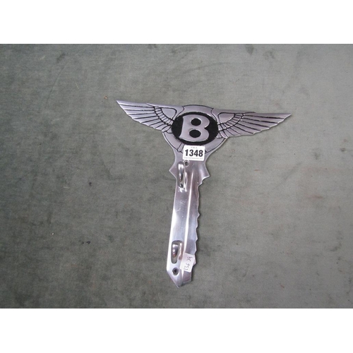 1348 - MOUNTED COAT HOOK WITH A BENTLEY MOTIF - 26cms H