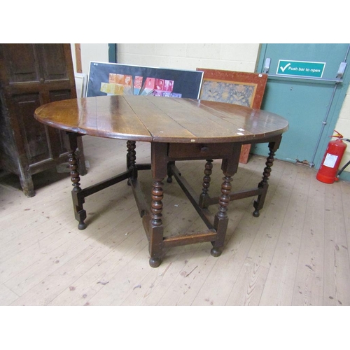 1753 - EARLY 18c TWIN FLAP OAK OVAL GATELEG TABLE WITH BOBBIN TURNED SUPPORTS 148cms W OPEN x 75cms H