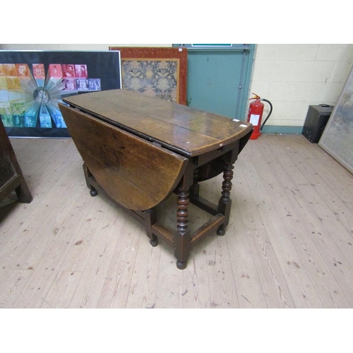 1753 - EARLY 18c TWIN FLAP OAK OVAL GATELEG TABLE WITH BOBBIN TURNED SUPPORTS 148cms W OPEN x 75cms H