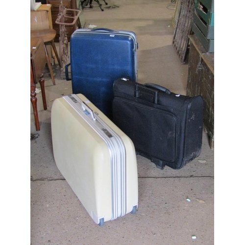 720 - THREE SUITCASES