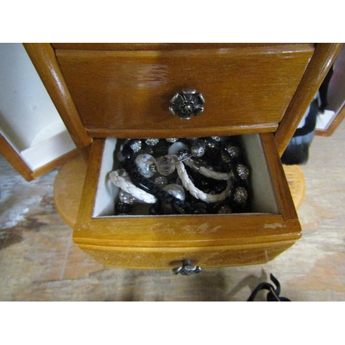 85 - JEWELLERY CABINET AND CONTENTS