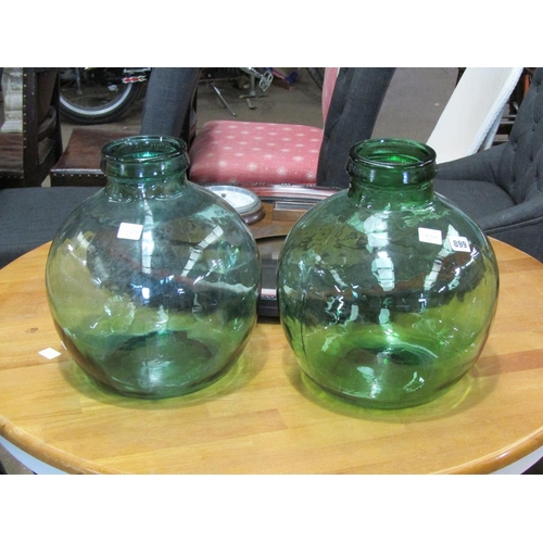 899 - TWO LARGE GREEN GLASS JARS