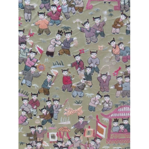 1252 - ORIENTAL EMBROIDERED PANEL - MANY PEOPLE, FRAMED, 64CM X 32CM