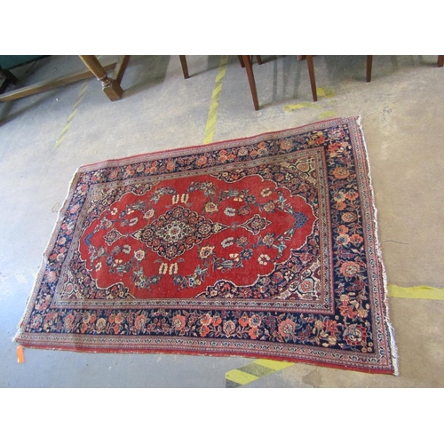 1925 - ORIENTAL WOOLLEN RUG OF RED AND BLUE GROUND, FLORAL PATTERNED 130 X 199 CMS