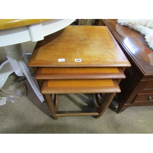 794 - NEST OF THREE TEAK TABLES