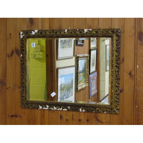 1223 - MOULDED GILT FRAMED WALL MIRROR, 94CM X 56CM