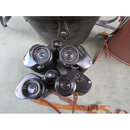 1400 - TWO PAIRS OF BINOCULARS IN CASES