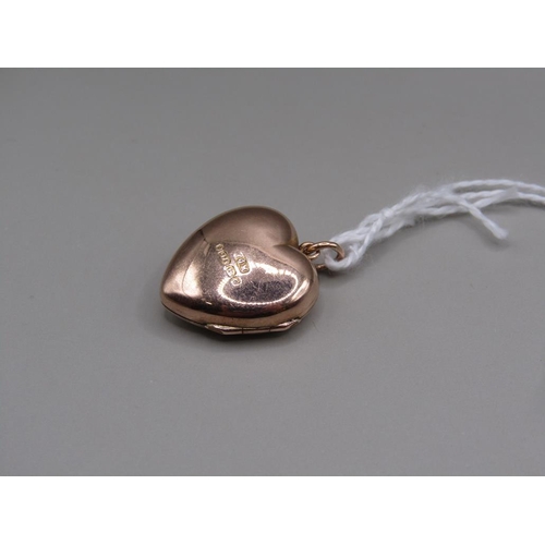 1624 - 9ct GOLD HEART SHAPED PENDANT LOCKET SET WITH SEED PEARLS