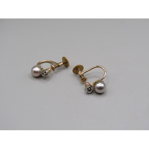 1633 - 9ct GOLD DIAMOND AND PEARL SCREW IN EARRINGS