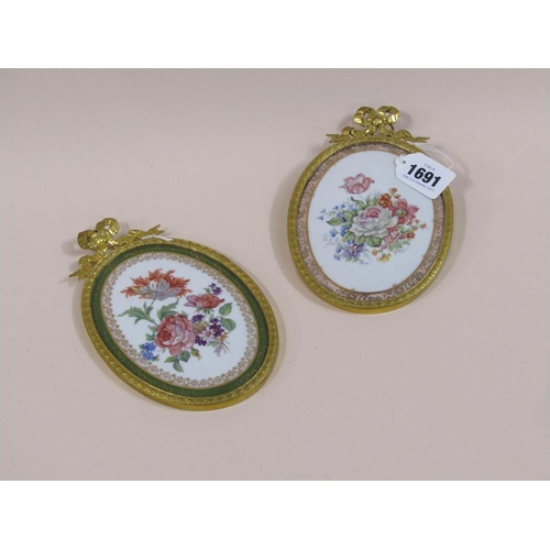 1691 - TWO OVAL LIMOGES PANELS IN GILT METAL FRAMES