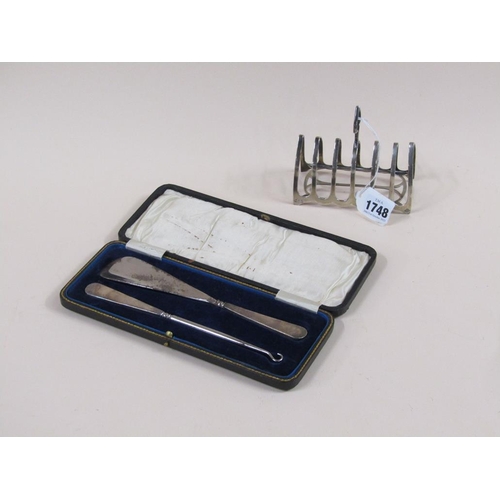 1748 - SILVER SIX DIVISION TOAST RACK AND A BOXED SILVER HANDLED BUTTON HOOK AND SHOE HORN