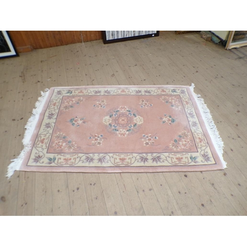 1963 - CHINESE PINK AND FAWN GROUND RUG, 122cm x 211cm