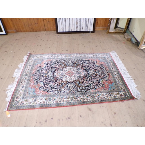 1970 - ORIENTAL SILK RUG WITH BORDER DECORATED WITH BIRD LEAF AND FLOWERS AND CENTRAL BLACK GROUND, 129cm x... 