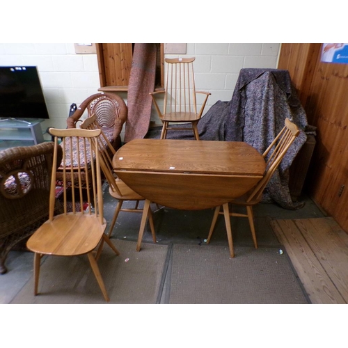 1978 - ERCOL TWIN FLAP DINING TABLE TOGETHER WITH FOUR STICK BACK CHAIRS