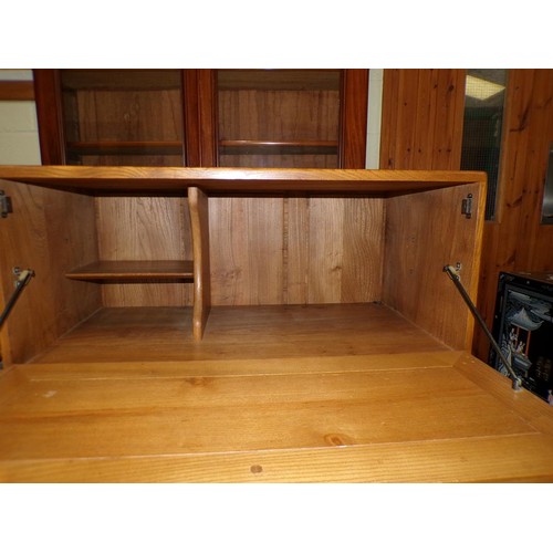 1979 - ERCOL SECRETAIRE CABINET WITH FALL FRONT OVER CUPBOARD AND ONE LONG BASE DRAWER 82 x 110cms