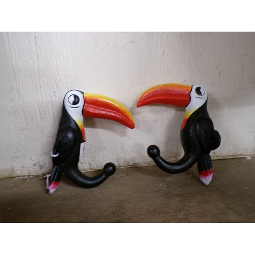 16 - PAIR OF METAL TOUCAN HOOKS