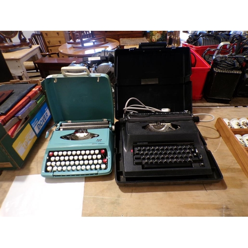 863 - TWO VINTAGE TYPEWRITERS