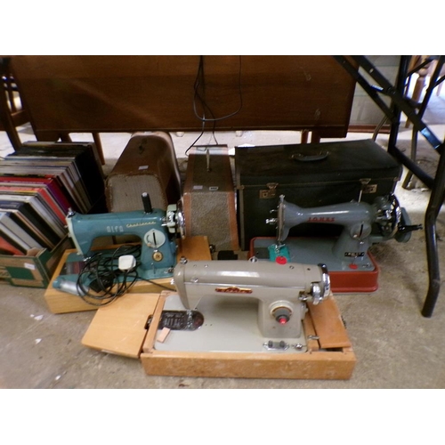 866 - THREE VINTAGE SEWING MACHINES