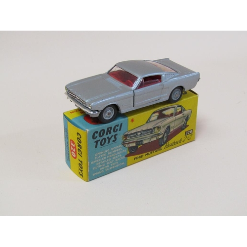 1697 - FOUR BOXED CORGI TOYS VEHICLES - NO.320 FORD MUSTANG FASTBACK 2X2, 218 ASTON MARTIN DB4, 154 FERRARI... 