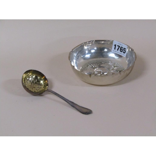 1765 - CONTINENTAL SILVER HAMMERED BOWL AND A CONTINENTAL SILVER SIFTING SPOON, 3.6ozt