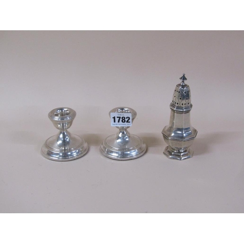 1782 - PAIR OF SQUAT SILVER CANDLESTICKS AND A SMALL SILVER SUGAR SIFTER