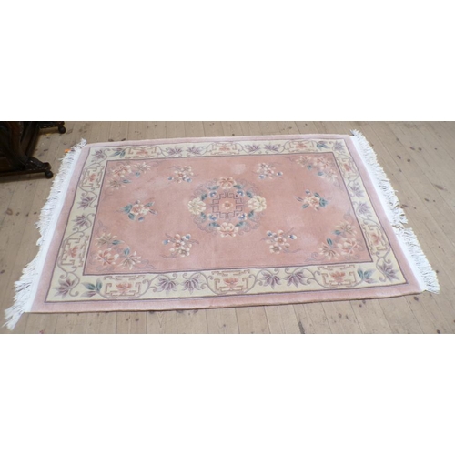 2087 - CHINESE PINK GROUND FLORAL PATTERN RUG 123CM X 211CM