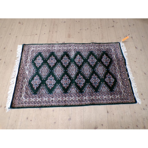 2096 - ORIENTAL GREEN GROUND RUG 92CM X 163CM