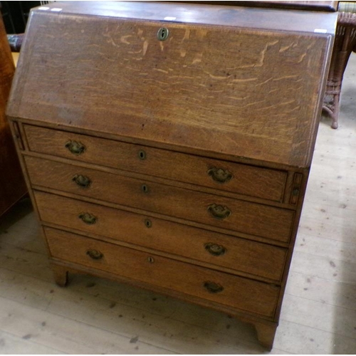 2099 - LATE GEORGIAN OAK BUREAU WITH FALL FRONT AND FITTED INTERIOR OVER FOUR LONG DRAWERS, 115CM H