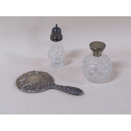 1778 - SILVER BACKED MIRROR, SILVER TOPPED SCENT BOTTLE AND A SILVER TOPPED SIFTER