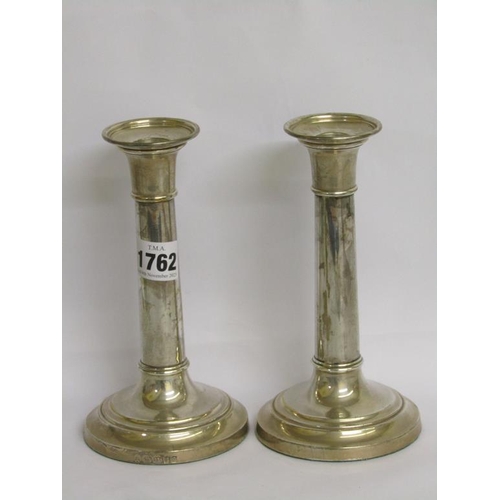 1762 - PAIR OF SILVER CASED CANDLESTICKS