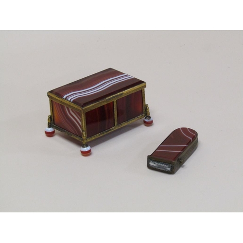 103 - An early 20c banded agate and brass framed box on agate ball feet, together with a vesta case of sim... 