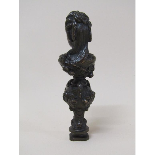 108 - A 19c patinated bronze seal stamp in the form of the bust of a lady, 10cm h.