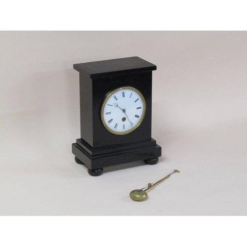 18 - A mid 19c English mantel clock in a rectangular black marble case, the central section hewn from a s... 