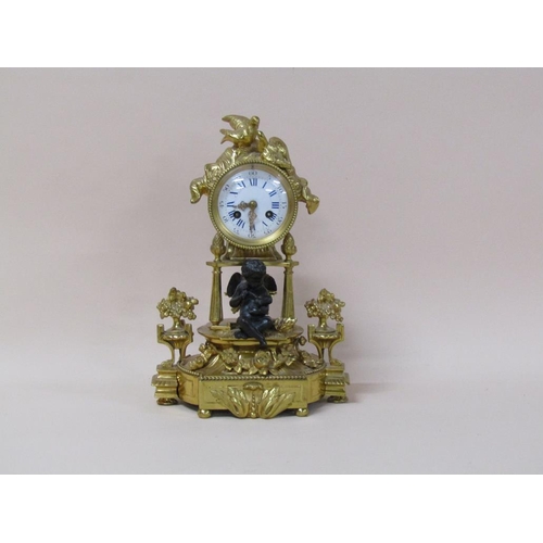 30 - A late 19c French mantel clock in ormolu case, the clock drum supported by three columns on a decora... 