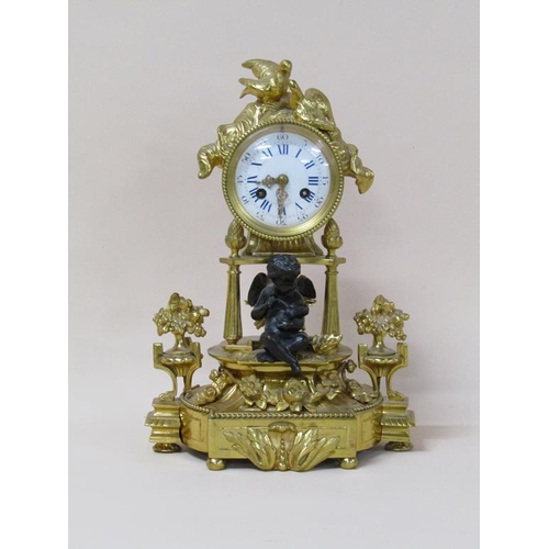 30 - A late 19c French mantel clock in ormolu case, the clock drum supported by three columns on a decora... 