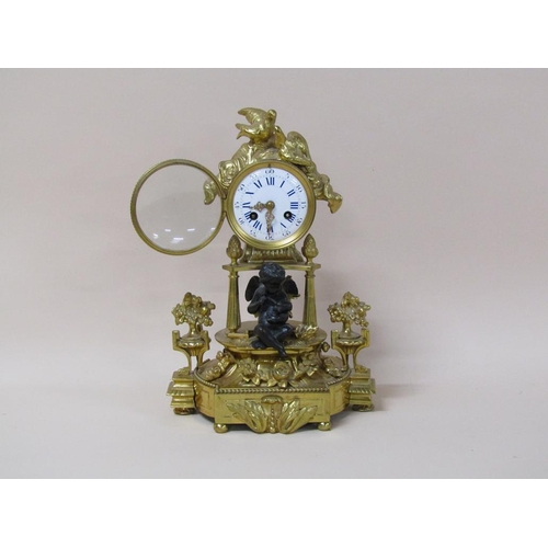 30 - A late 19c French mantel clock in ormolu case, the clock drum supported by three columns on a decora... 