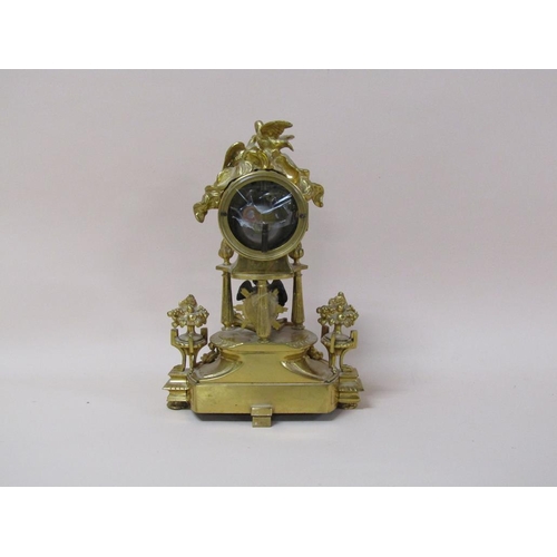 30 - A late 19c French mantel clock in ormolu case, the clock drum supported by three columns on a decora... 