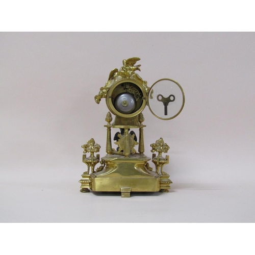 30 - A late 19c French mantel clock in ormolu case, the clock drum supported by three columns on a decora... 