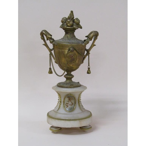 31 - A late 19c French garniture de Cheminée comprising a figural mantel clock and two urns.  The clock d... 