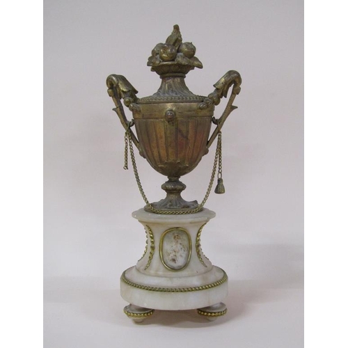 31 - A late 19c French garniture de Cheminée comprising a figural mantel clock and two urns.  The clock d... 