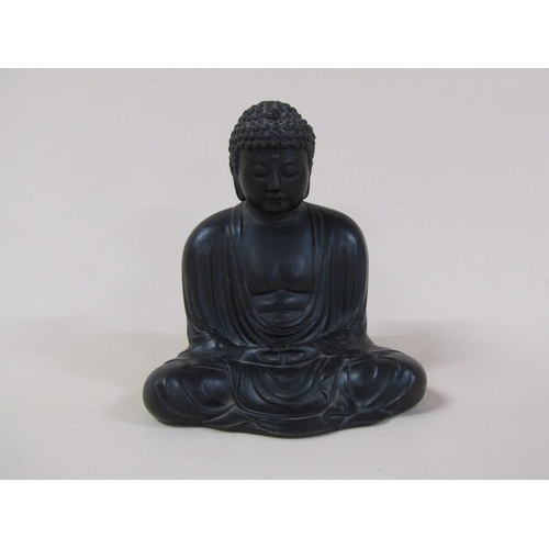 58 - A 19c Oriental bronze buddha, base inscribed, 13cm h.