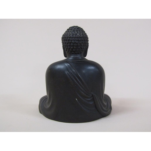 58 - A 19c Oriental bronze buddha, base inscribed, 13cm h.