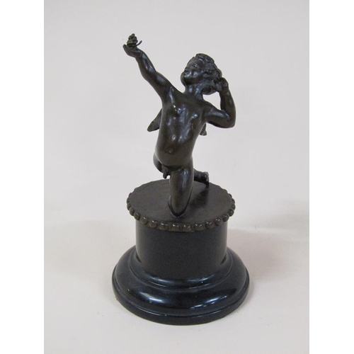 61 - A Tom Merrifield bronze figure of a cherub on circular beaded base and marble stand, the figure 12cm... 